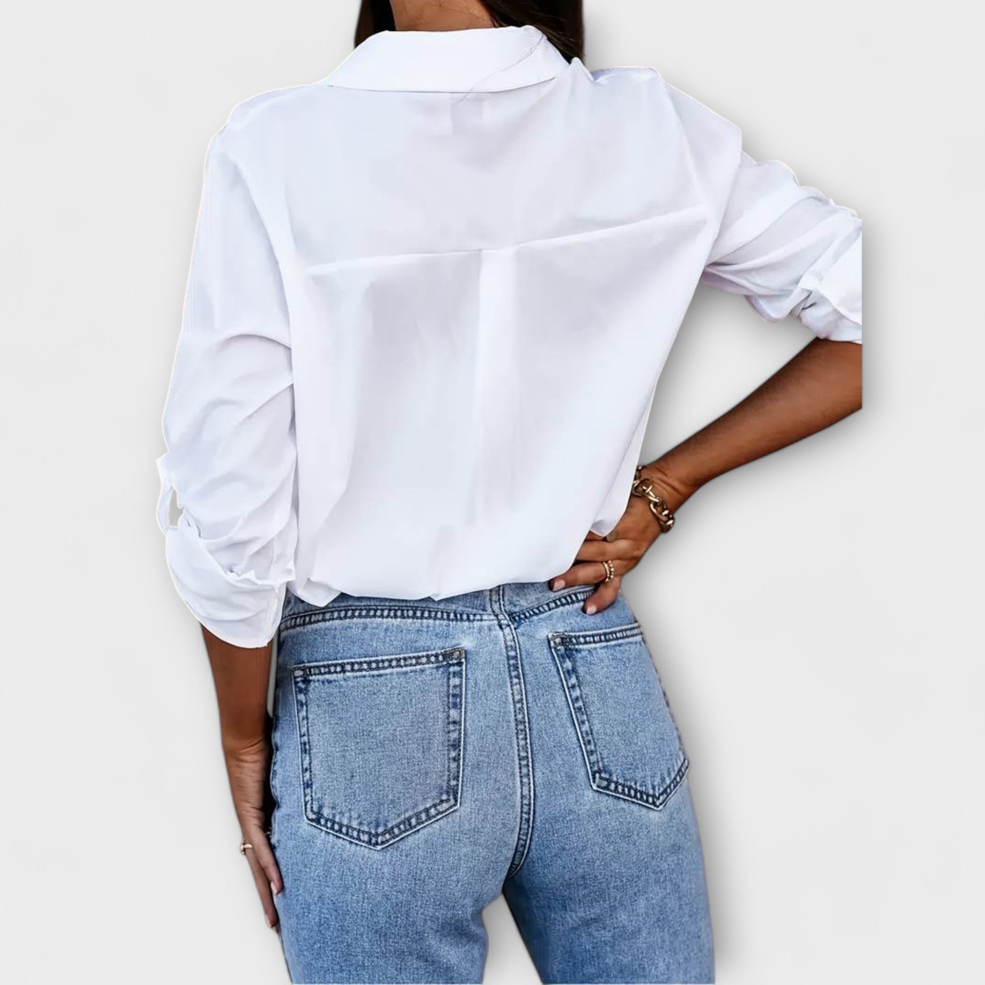 Jessica - swobodna bluzka z dekoltem w szpic